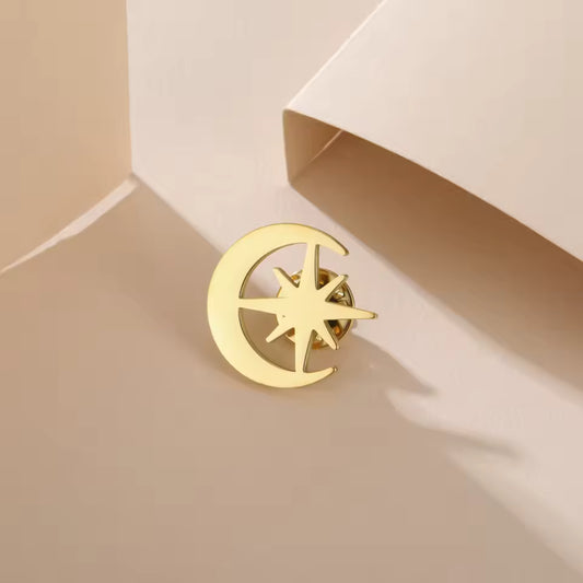 Broche éclat lunaire doré