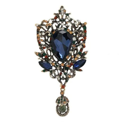 Broche plume royale