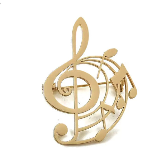 Broche clé de sol