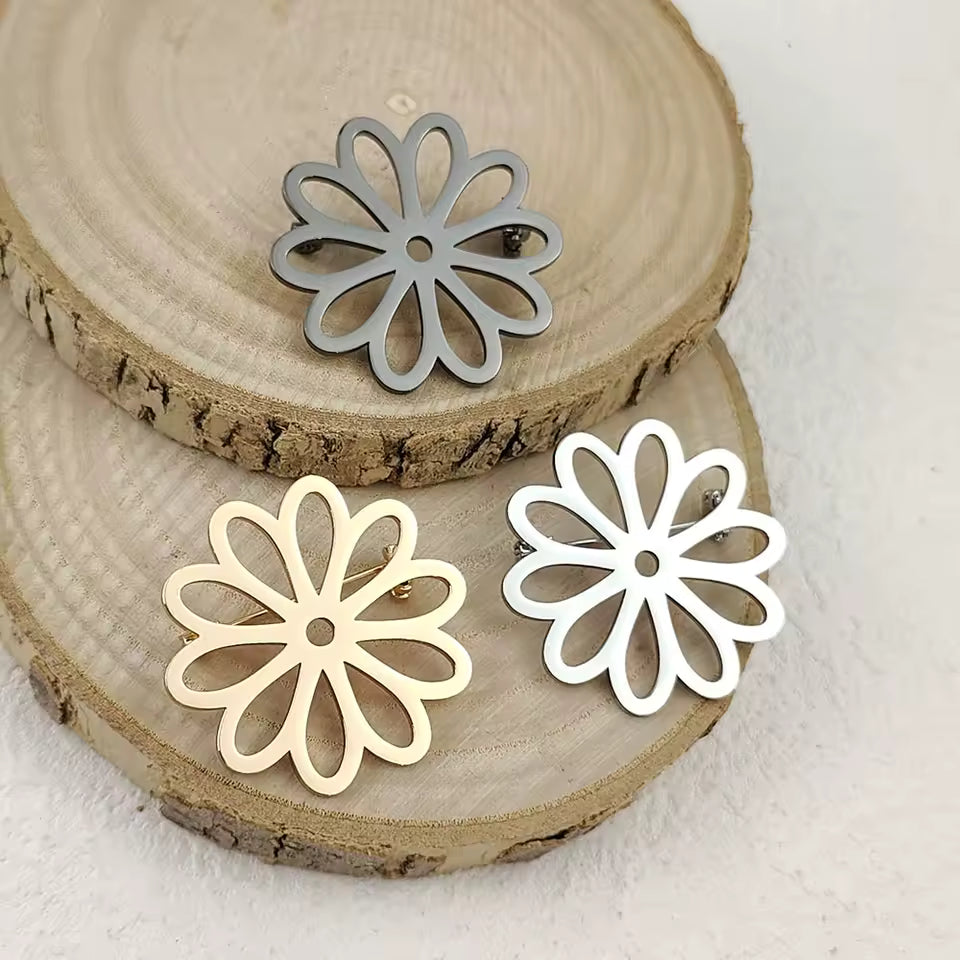 Broche marguerite ajourée photo