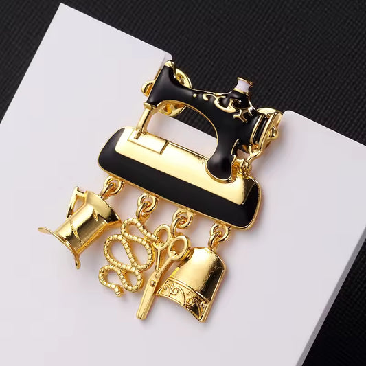 Broche atelier doré photo