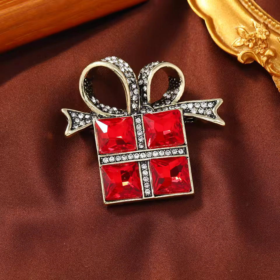 Broche cadeau rouge