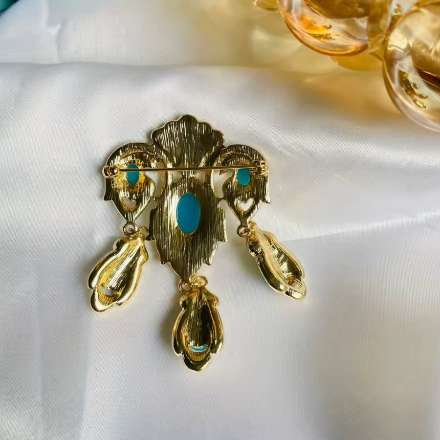 Broche cascade des oasis de dos