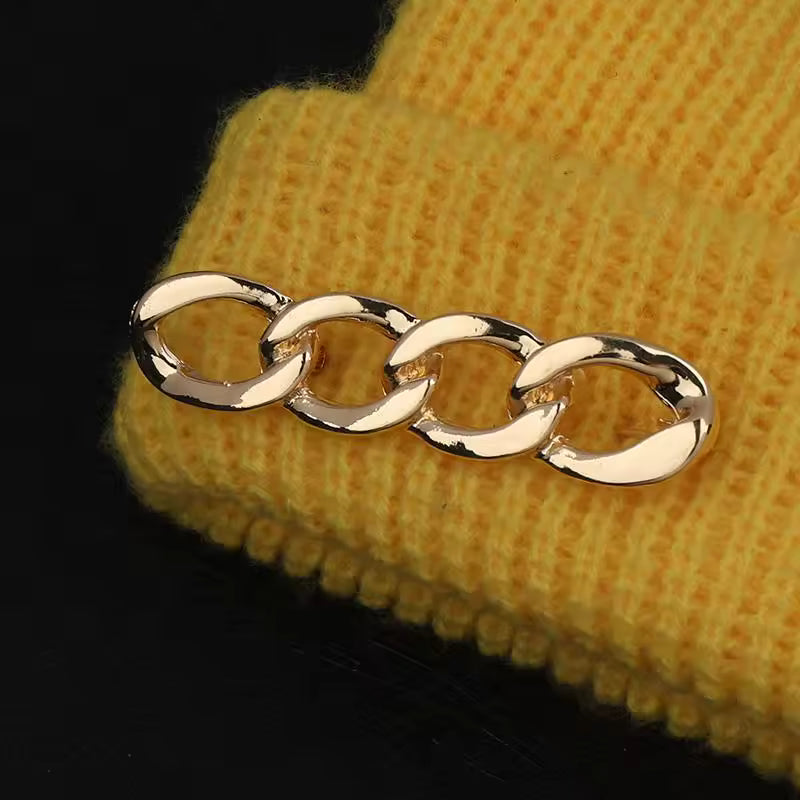 Broche chaîne bonnet