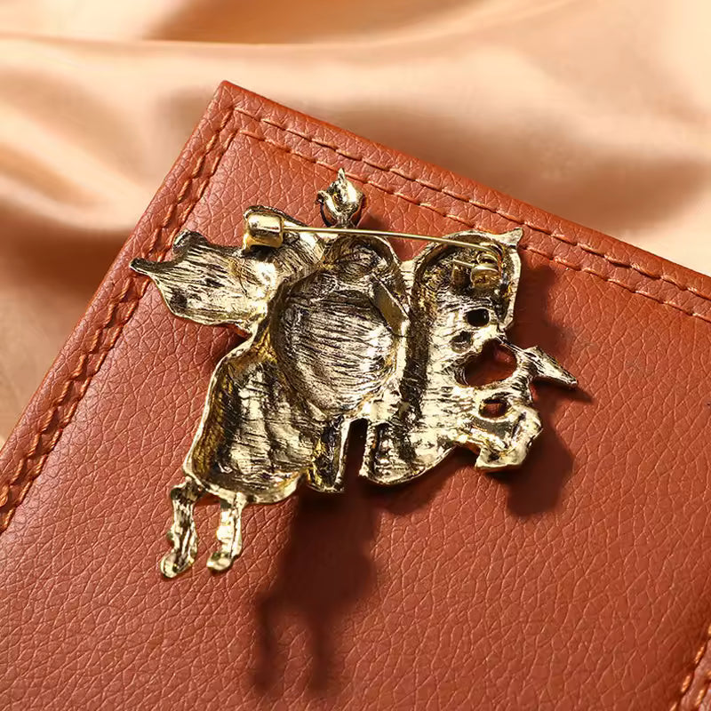 Broche chevalier de dos