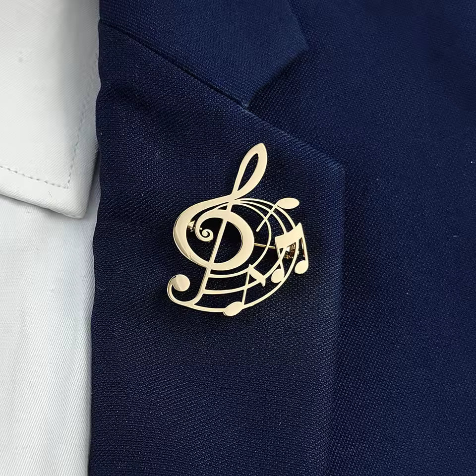 Broche clé de sol porté