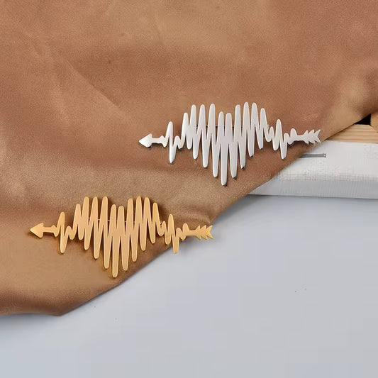Broche cœur palpitant