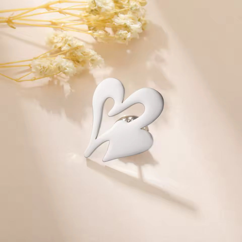 Broche cœur union argenté