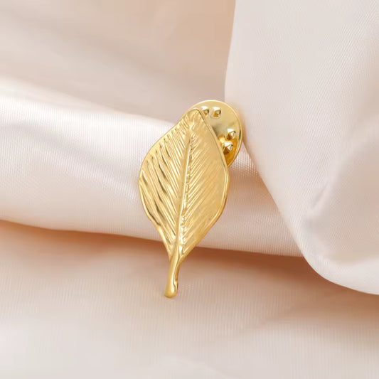 Broche feuille nervurée doré