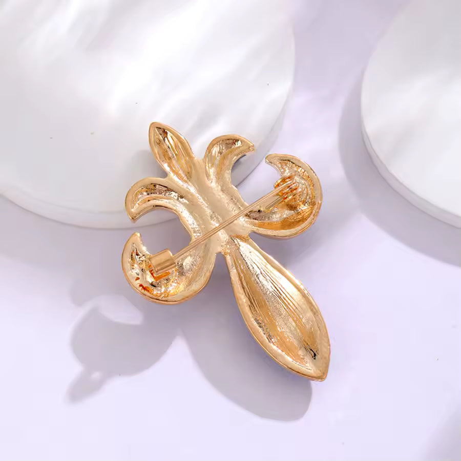 Broche fleur de lys éclatante de dos