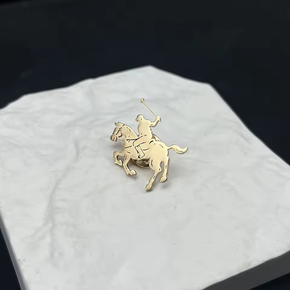 Broche golfe a cheval doré