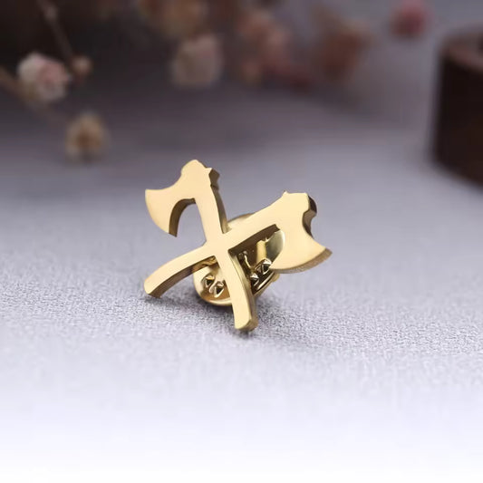 Broche haches croisées doré