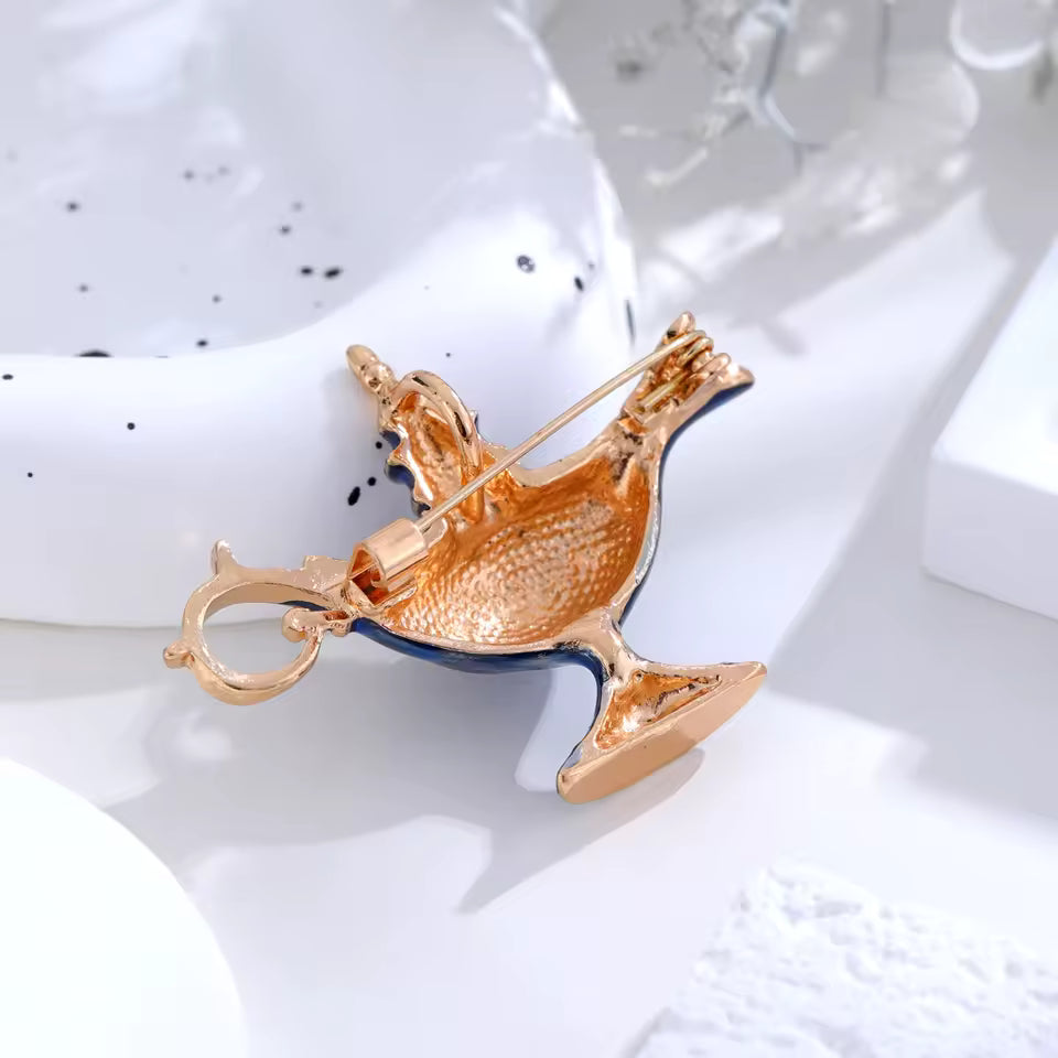 Broche lampe génie de dos
