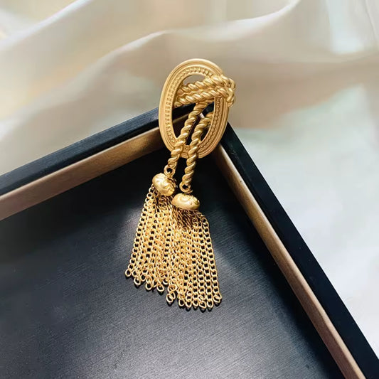 Broche lasso d’or photo