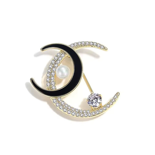 Broche lunes jumelles