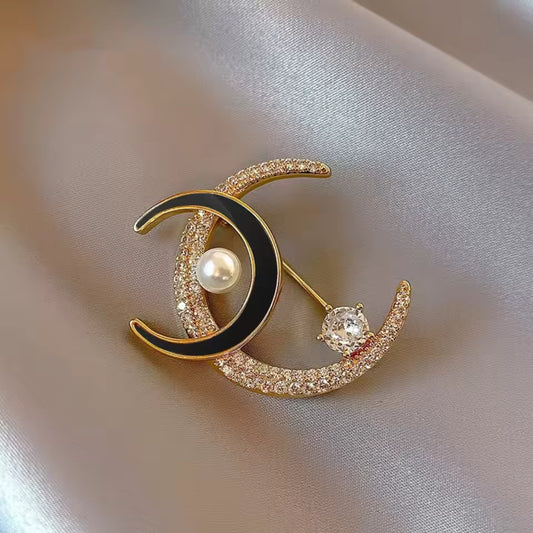 Broche lunes jumelles photo