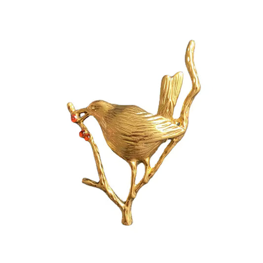 Broche oiseau aux baies