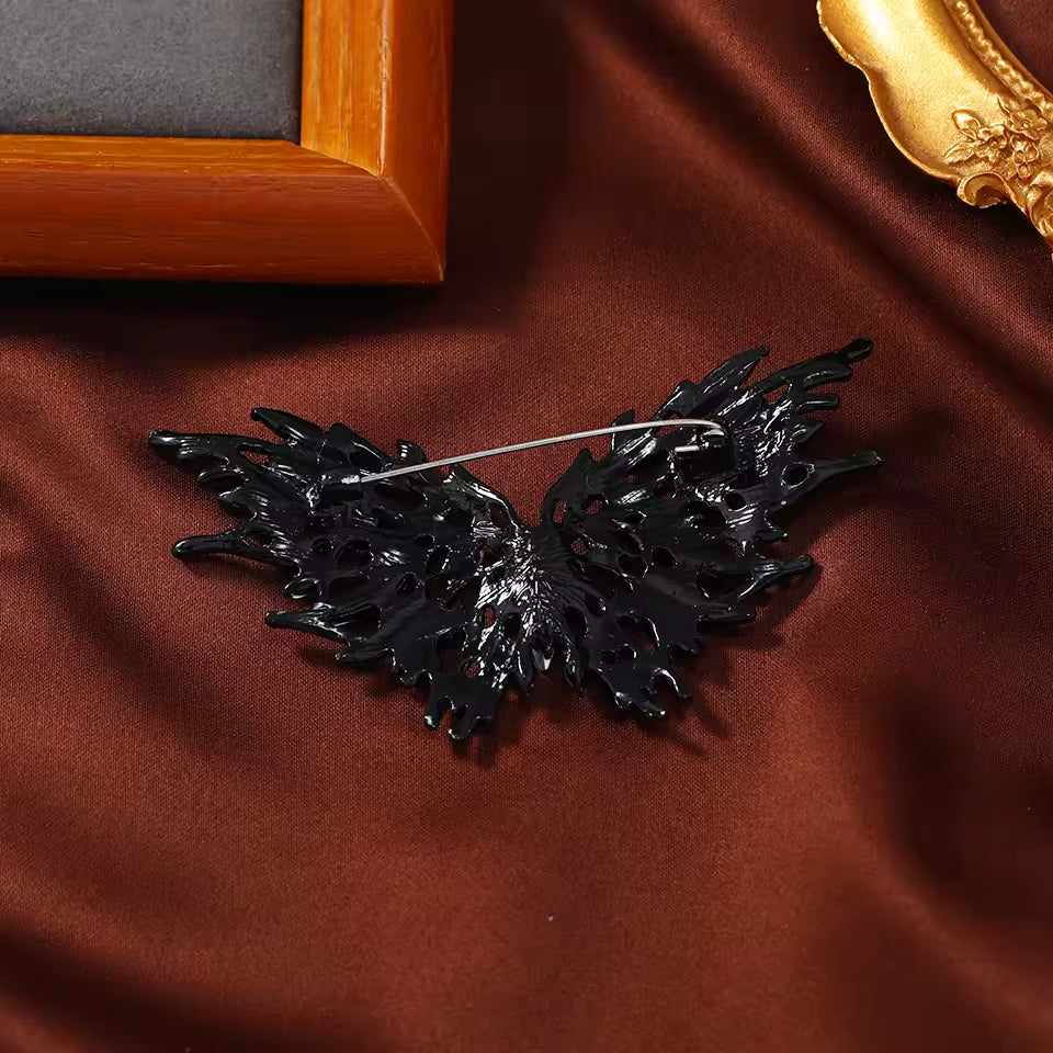 Broche papillon crépusculaire de dos