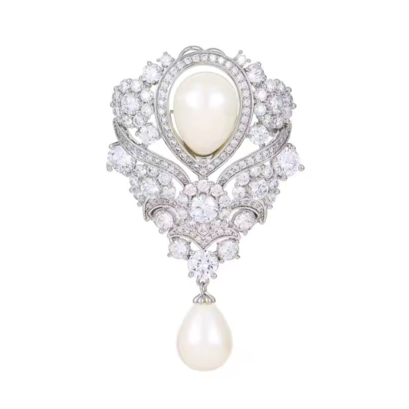 Broche perle de lumière