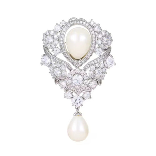 Broche perle de lumière