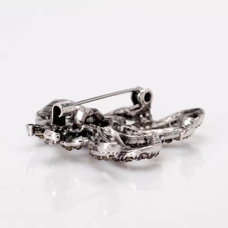 Broche pieuvre scintillante de dos