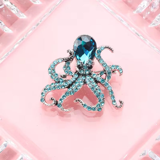 Broche pieuvre scintillante photo