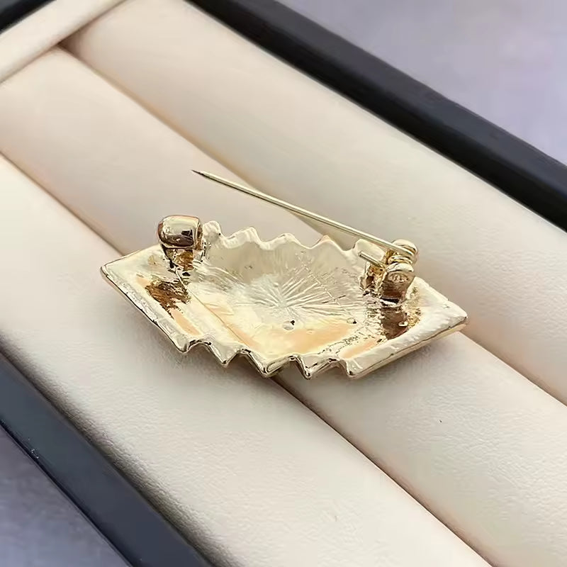 Broche prisme prestige de dos
