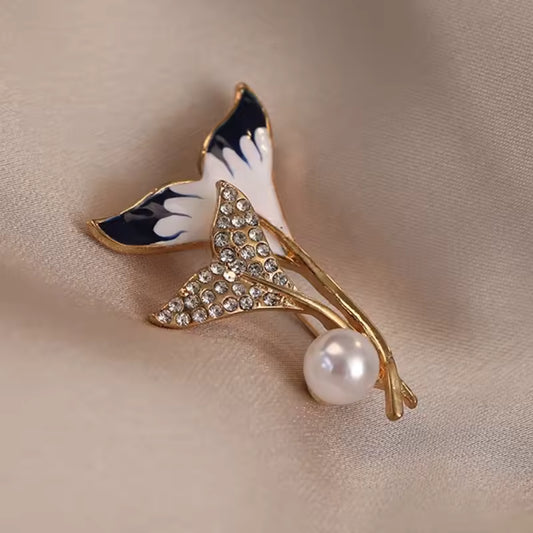 Broche queue de baleine photo