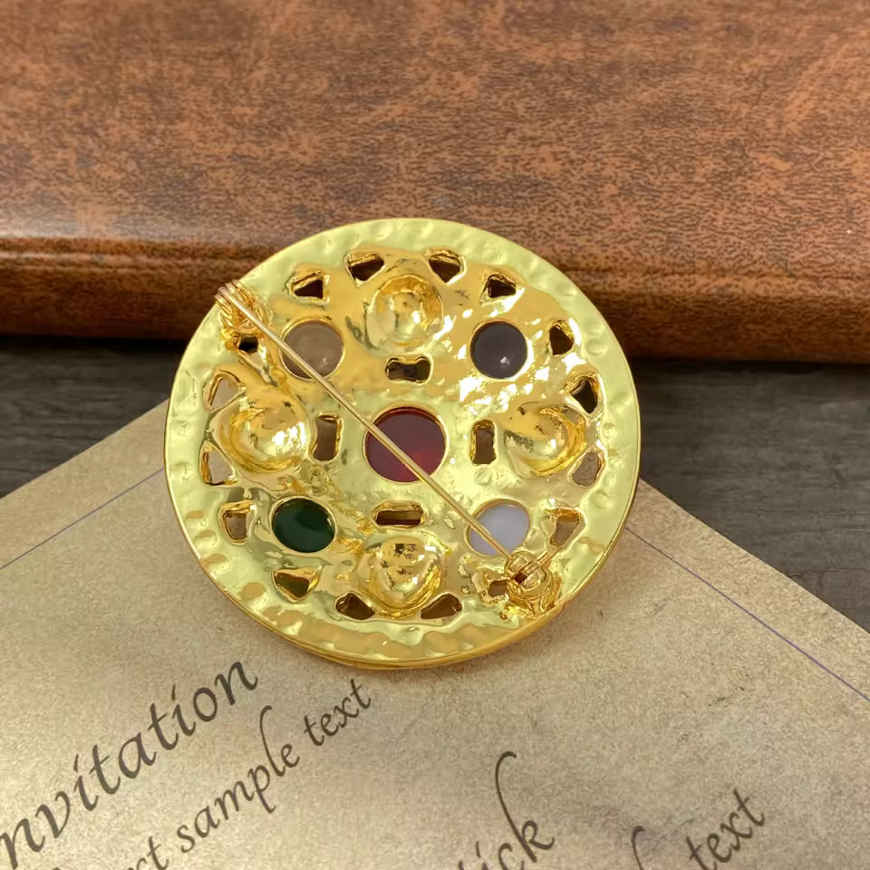 Broche sceptre des étoiles de dos