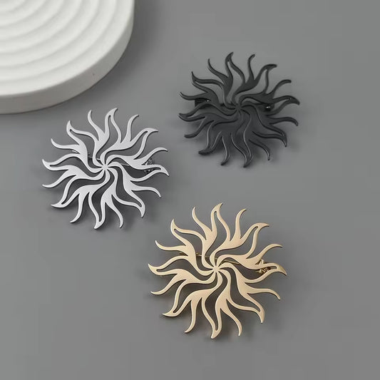 Broche soleil flamme photo