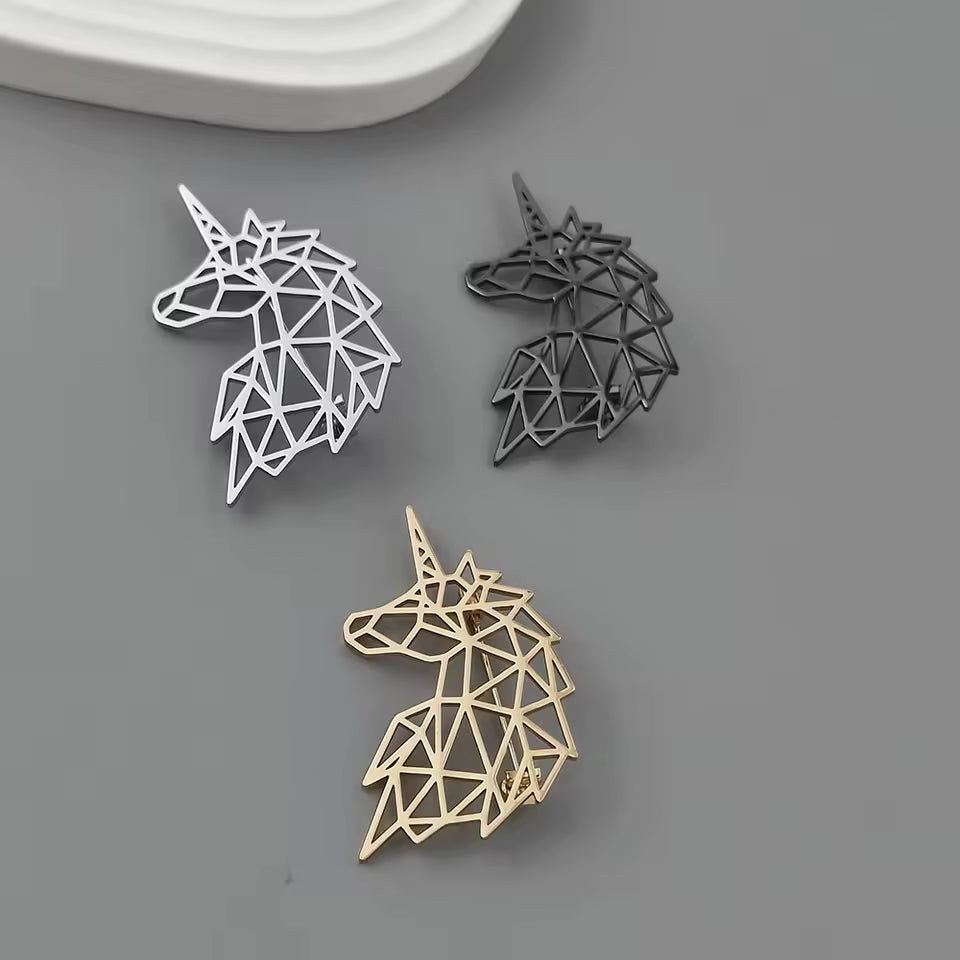 Broche tête de licorne photo