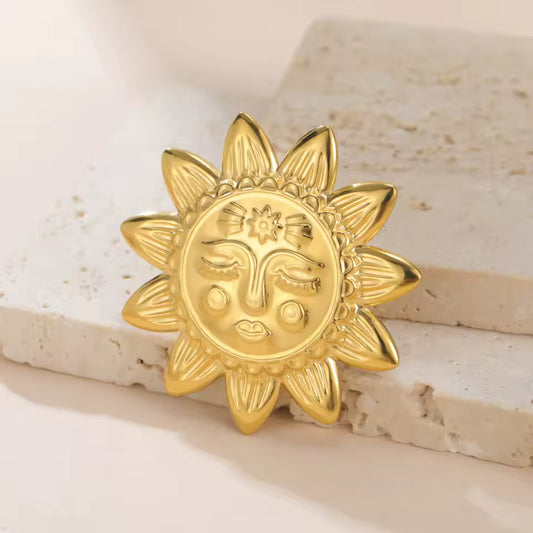 Broche visage ensoleillé dorée