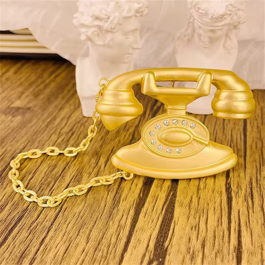 Broche appel doré, vue complémentaire