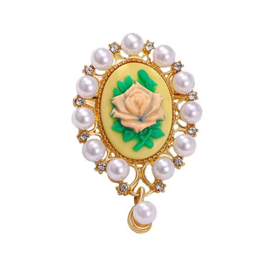Broche camée florale, finition dorée, alliage métallique