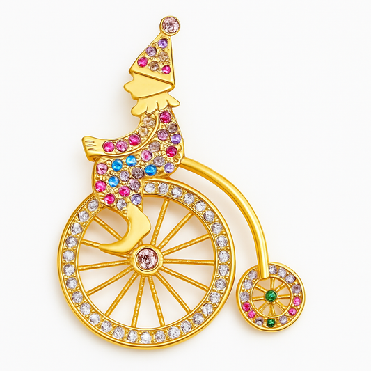 Broche clown vélocipède, finition dorée, alliage métallique