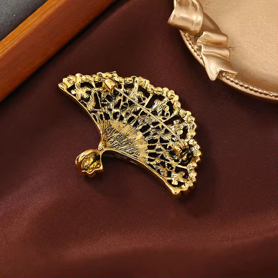 Broche éventail fleuri vue de dos, fermoir épingle