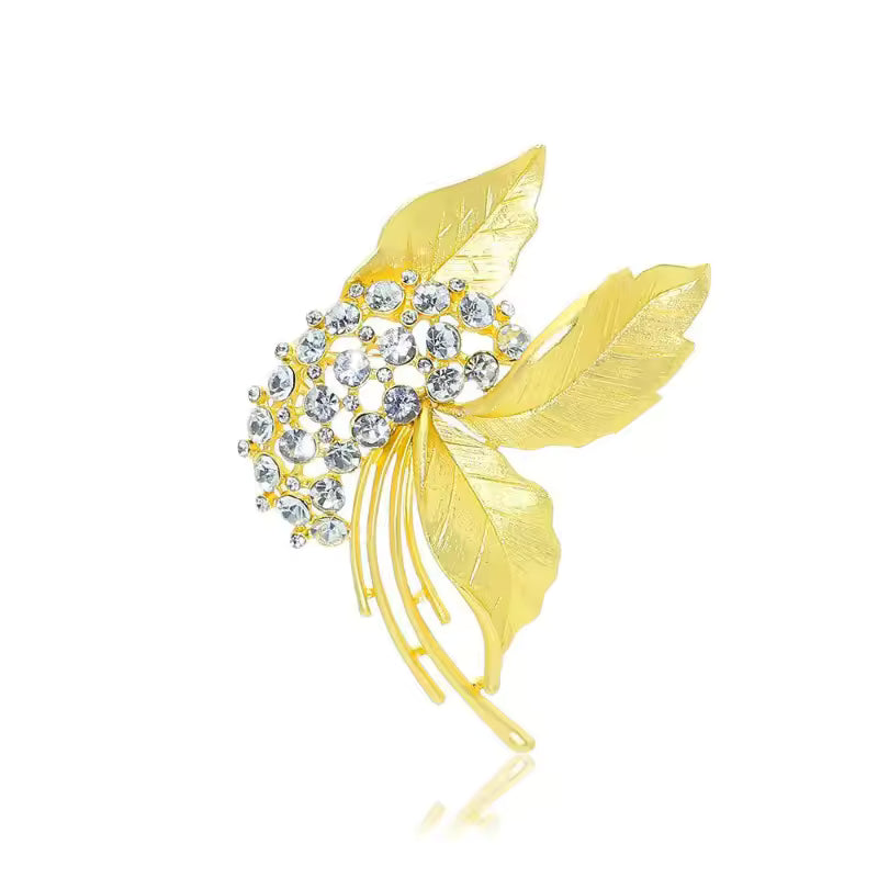 Broche feuille éclat, finition dorée, alliage métallique