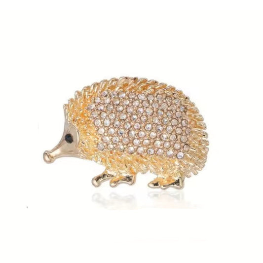 Broche hérisson strass, finition dorée, alliage métallique