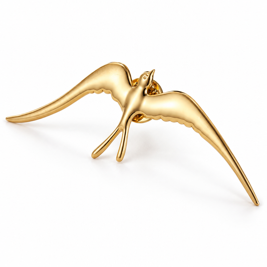 Broche hirondelle, finition dorée, alliage métallique