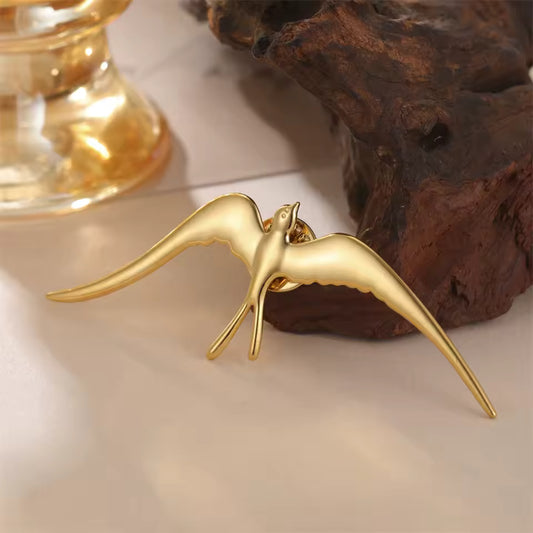 Broche hirondelle, vue complémentaire