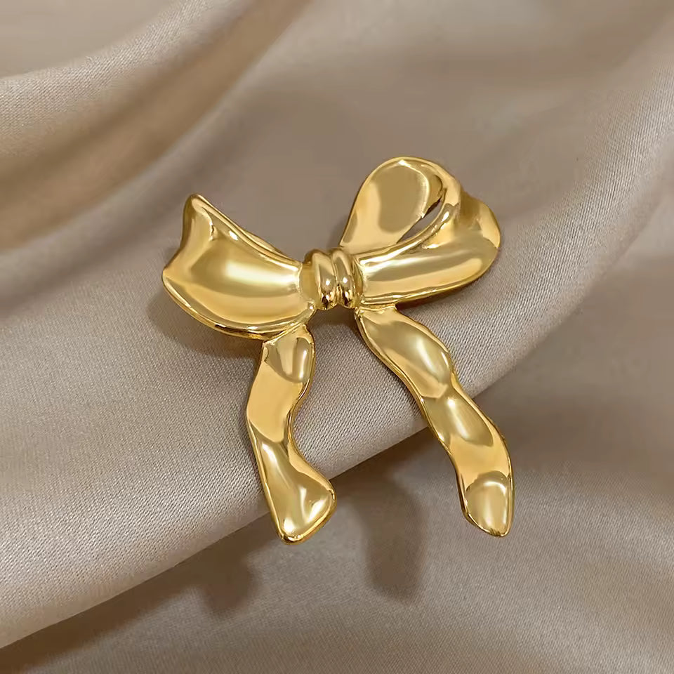 Broche nœud papillon doré, vue complémentaire