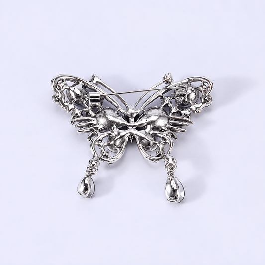 Broche papillon des joyaux vue de dos, fermoir épingle