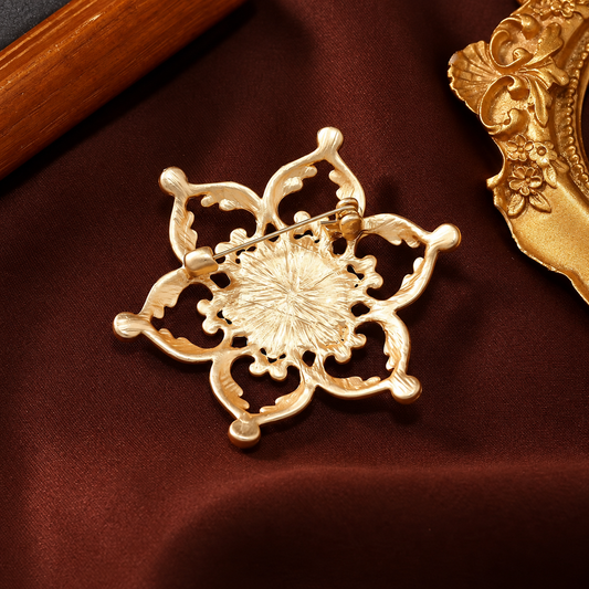 Broche perle royale