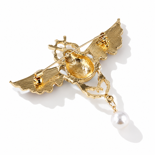 Broche scarabée de l’aube vue de dos, fermoir épingle