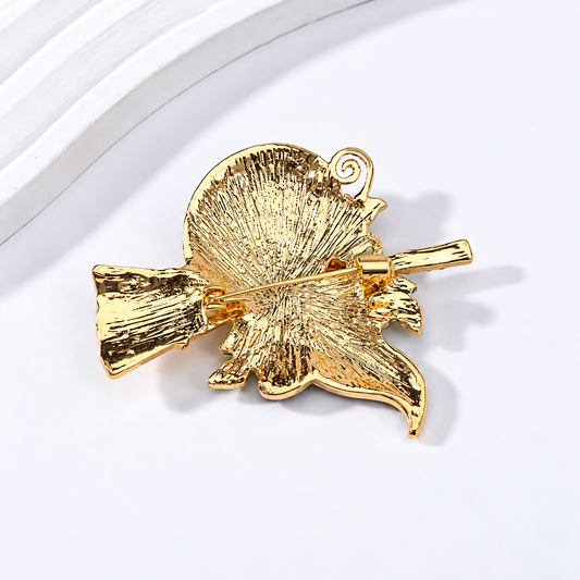 Broche sorcière citrouille vue de dos, fermoir épingle